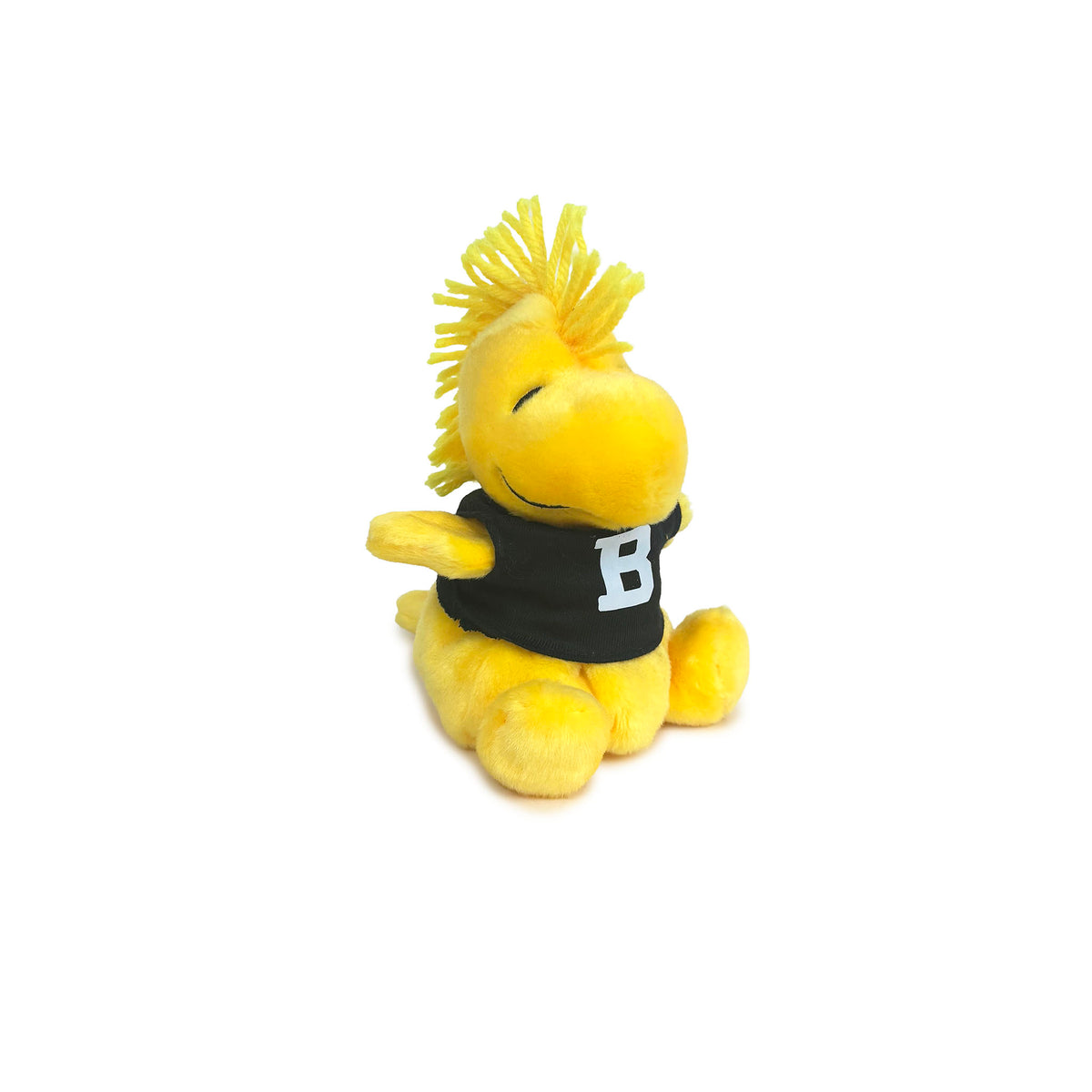 A yellow plush toy bird character wearing a black t-shirt with a white letter 'B' on the front, set against a plain white background.