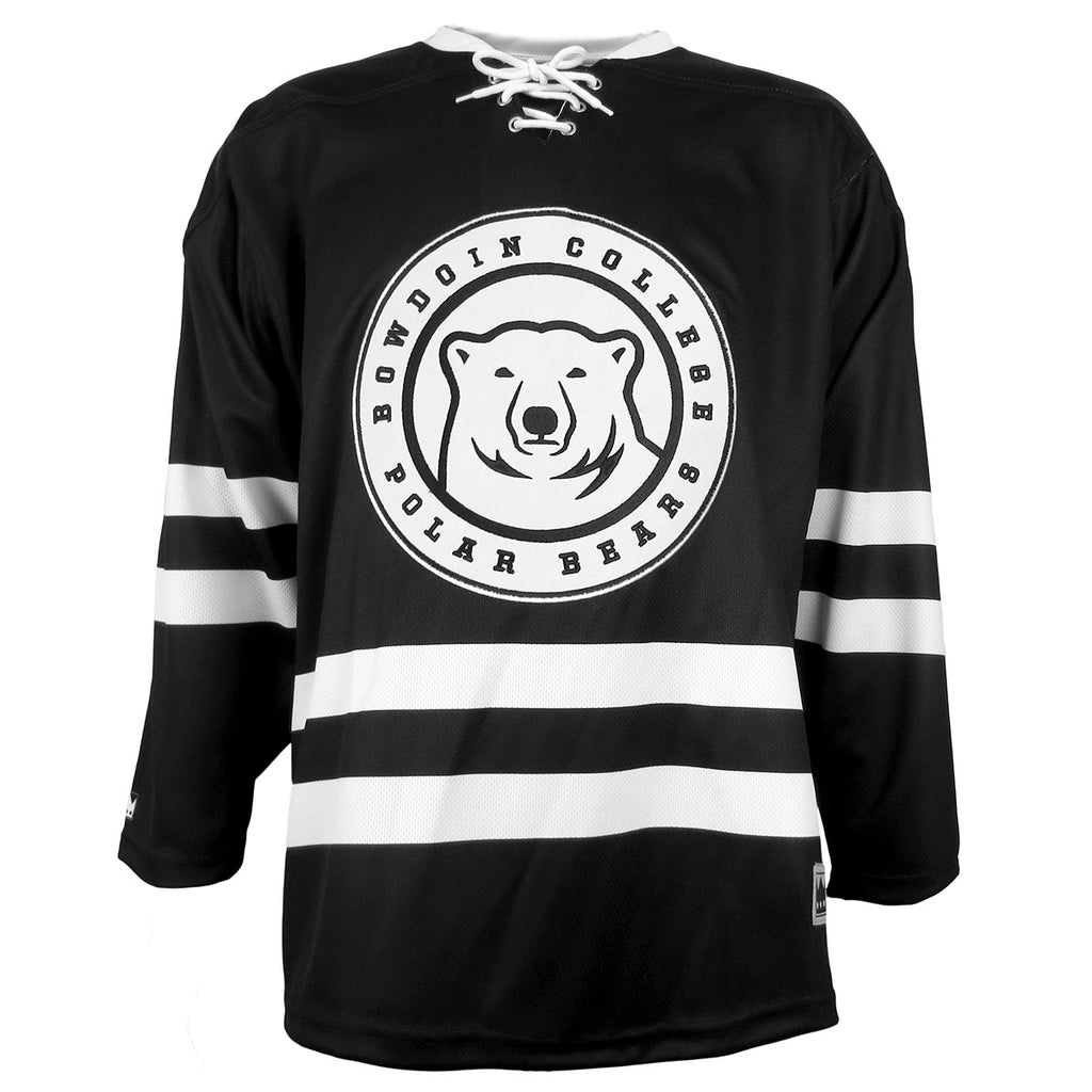 Black hockey jersey with white collar, white laces at throat, double white stripes on arms and lower torso. Large white patch applique with black embroidery of a mascot medallion surrounded by the words BOWDOIN COLLEGE POLAR BEARS.