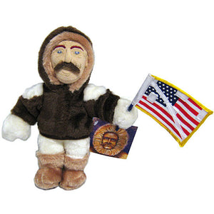 Plush Robert Peary doll in parka with patched American flag accessory.