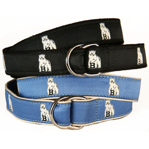 Stacked D-ring belts in black and light blue. The ribbon is pattered with repeating polar bear mascots.