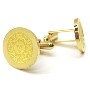 Gold cufflinks with engraved Bowdoin College seal.