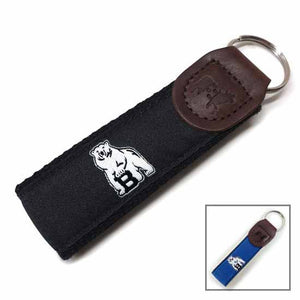 Montage of 2 colors of Belted Cow key fobs