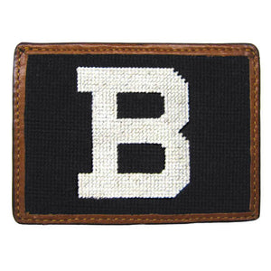 Leather card wallet with needlepoint decoration of white B on black field.