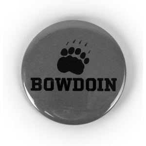 Grey button with black paw print over BOWDOIN imprint.