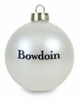 Reverse side of pearl white ornament showing black BOWDOIN wordmark