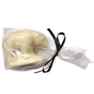 White chocolate polar bear wrapped in cellophane bag tied with black curling ribbon.