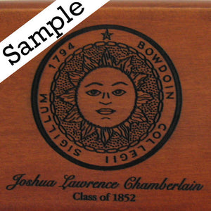 Closeup detail showing engraving of Bowdoin sun seal and sample personalization for Joshua Lawrence Chamberlain, Class of 1852.