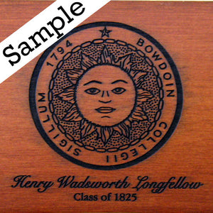 Closeup showing sample engraving on chair top of Bowdoin sun seal above cursive text HENRY WADSWORTH LONGFELLOW and below, in regular serif text CLASS OF 1825