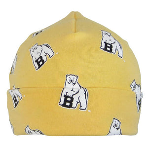 Butter yellow infant warming cap with turned-up cuff and all-over polar bear mascot print.