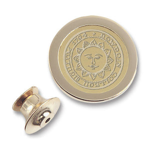 Engraved Bowdoin sun seal lapel pin in gold tone.