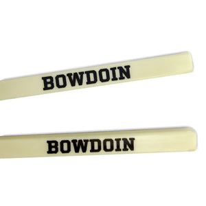 Detail of BOWDOIN imprint on chopsticks.