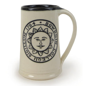 Natural colored stoneware stein mug with black interior and black imprint of Bowdoin sun seal.
