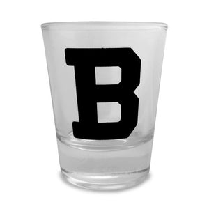 Clear shot glass with large black B imprint.