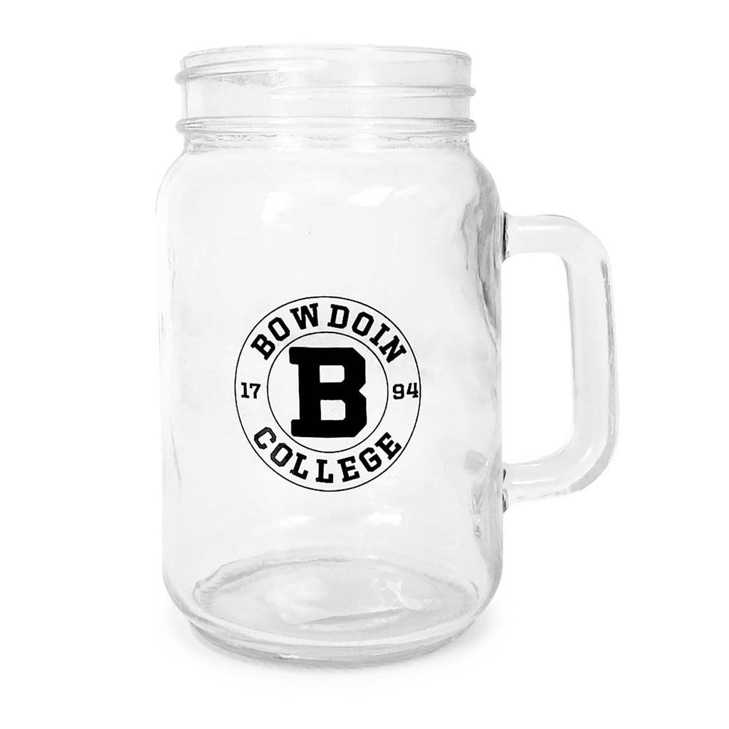 Clear glass mason-jar style mug with a handle and a circular black imprint. There is a black circle, and within it is curved text reading BOWDOIN on top, and COLLEGE on the bottom, with 17 on the left and 94 on the right. Inside is a smaller black circle, and inside that is a large B in the official Bowdoin College athletic logotype.