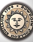 Closeup of Bowdoin College seal medallion.