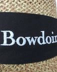 Closeup of black band showing detail of white embroidered BOWDOIN.