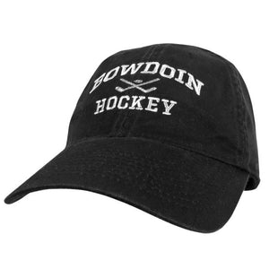 Black twill baseball cap with white embroidery of BOWDOIN arched over crossed hockey sticks over the word HOCKEY.