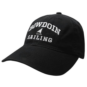 Black twill baseball cap with white embroidery of BOWDOIN arched over an icon of a sailboat over the word SAILING.
