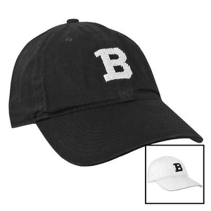 Montage of black and white S&B baseball hats.
