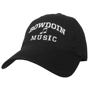 Black ball cap with white embroidery of BOWDOIN arched over a musical note over MUSIC