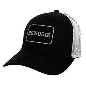 Trucker hat with black front and white mesh back. Black patch on front with embroidered silver border and embroidered silver BOWDOIN.