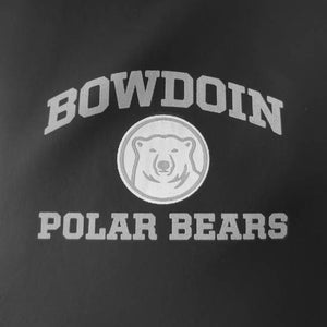 Closeup of imprint on black jacket. Gray arched BOWDOIN over gray and white mascot medallion over the words POLAR BEARS in gray.
