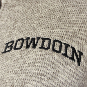 Closeup detail showing quality of black arched BOWDOIN embroidery on oatmeal fleece.