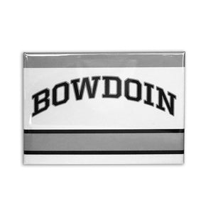 Rectangular white magnet with grey stripe at top, over arched BOWDOIN in black with grey outline, over a grey stripe with black bars on top and bottom.