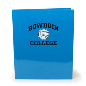 Blue laminated folder with imprint of black arched BOWDOIN over white and black mascot medallion over black COLLEGE.