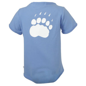 The back of a blue diaper shirt showing a large polar bear paw print in white.