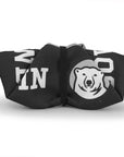 Fabric Bowdoin dog bowl collapsed and bundled in attached elastic band.