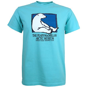 Lagoon blue short-sleeved T-shirt with picture of a polar bear sitting against the side of a rectangle with a blue background. Text beneath reads THE PEARY-MACMILLAN ARCTIC MUSEUM, BOWDOIN COLLEGE, BRUNSWICK, MAINE