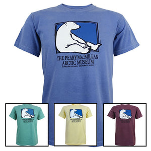 Four different colors of Peary-MacMillan Arctic Museum T-shirts