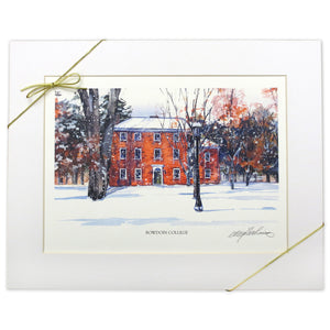 Watercolor print of Mass Hall in the snow, with white mat board