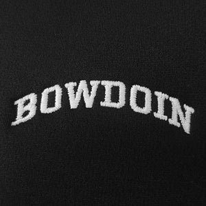 Closeup of white Bowdoin embroidery.