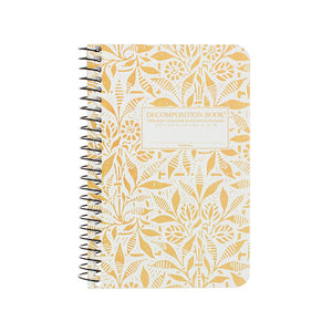 Pocket-sized coilbound Decomposition book with abstract flowers on cover.