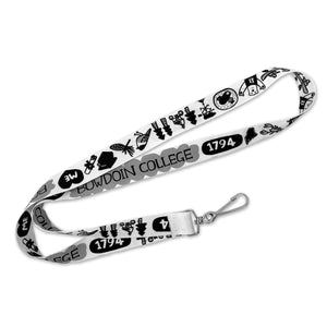 White lanyard with print on both sides of whimsical black and white cartoon illustrations of BOWDOIN COLLEGE, pine trees, bicyclists, canoeists, a Polar Bear mascot, a rolled diploma, chickadee, pine cone, mortarboard hat, and the initials ME in a heart.