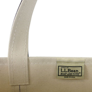 A closeup shot of the L.L.Bean patch on the inside of a canvas tote bag.