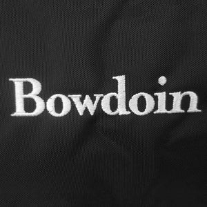 Detail showing quality of white Bowdoin wordmark embroidery.