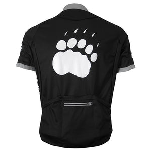 Back view of cycling jersey showing white paw print on back.