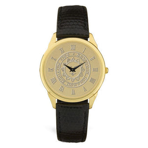 Gold wrist watch with black leather strap. Face is engraved wth Bowdoin sun seal.