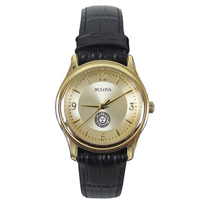 Gold tone wristwatch with black strap. Small Bowdoin sun seal on face, which has gold hour markers with arabic numerals at 12, 3, 6, and 9.